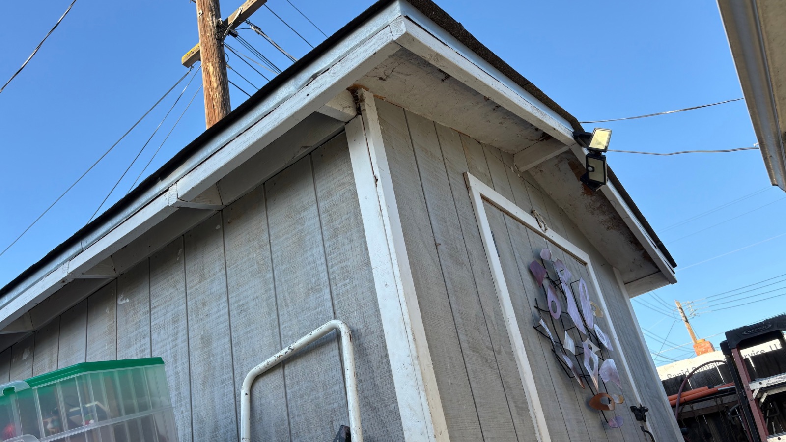 Light demolition in Los Banos California removing an old backyard structure and debris